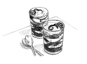 Berry Good Sauce Berry Good Sauce swirled into homemade ice cream in glasses.